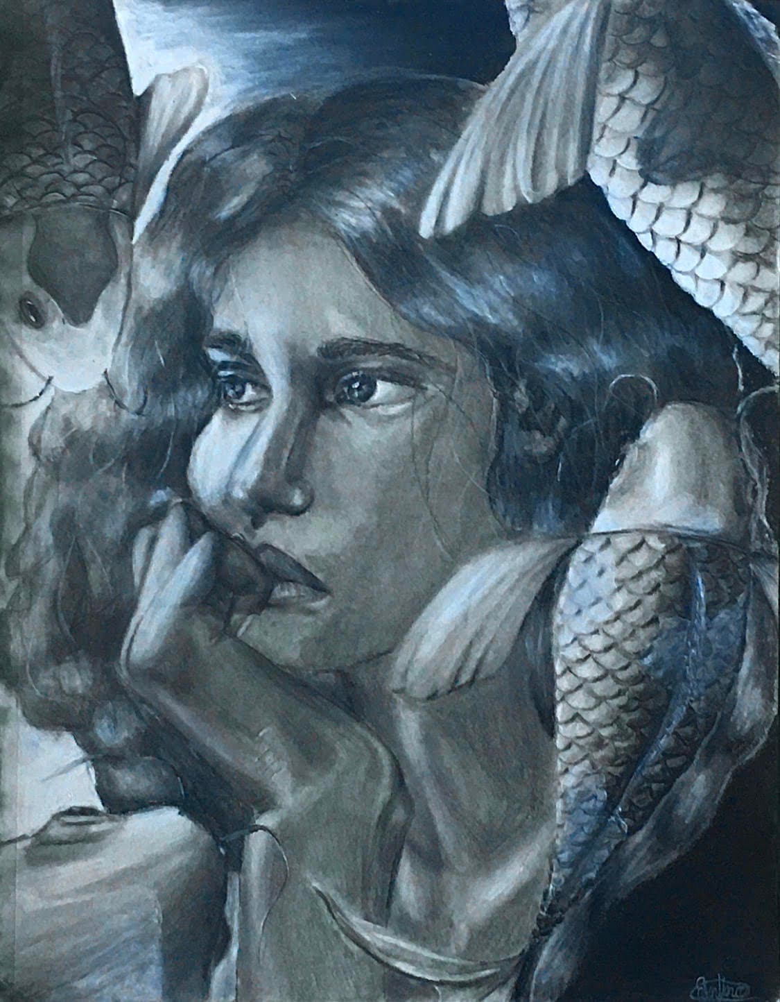A graphite face ringed by pale fish.